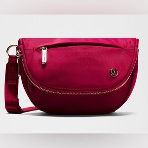 NWT lululemon athletica Berry rumble/gold Festival Bag 2 litres - retired bah